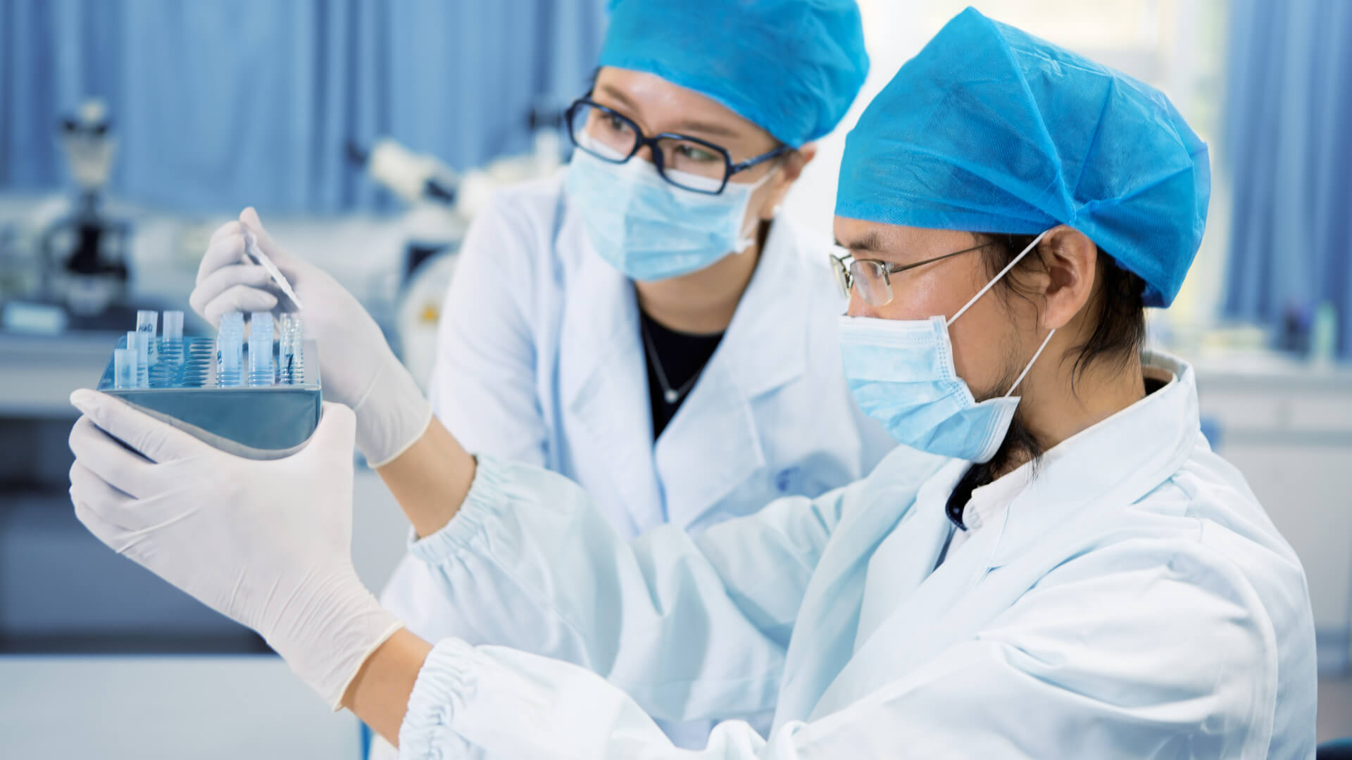 Specialist Reviewing Vials Image